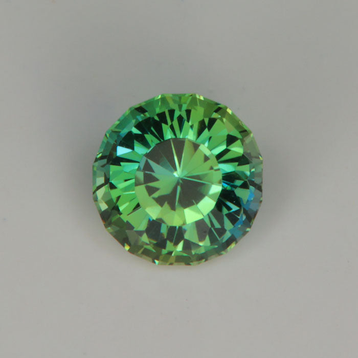 green color fancy tanzanite gemstone round portuguese cut