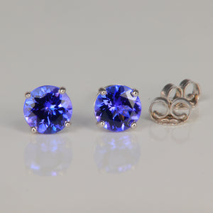 round cut tanzanite stud earrings in white gold