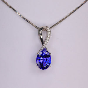 oval cut tanzanite pendant in white gold with diamonds