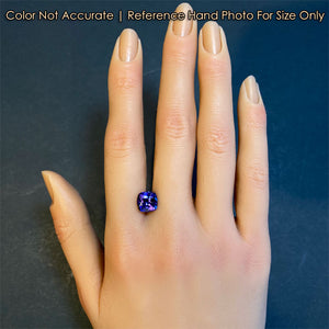 square cushion cut tanzanite gem size on hand