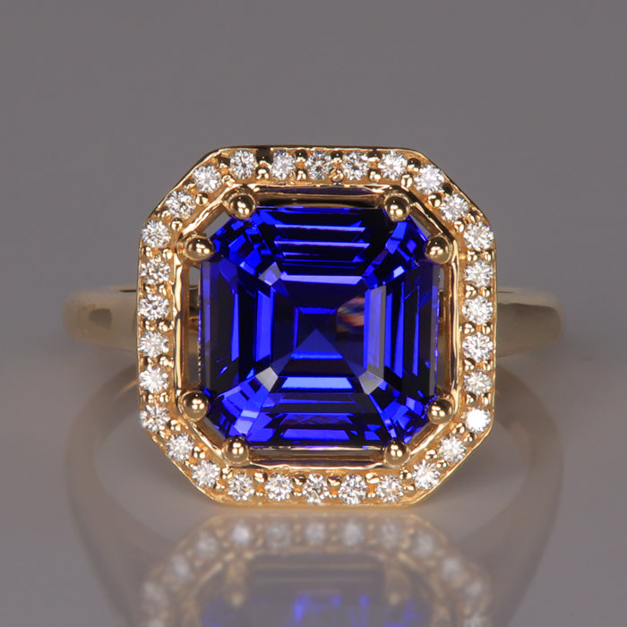 Gold 5 tanzanite and diamond chips store ring