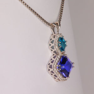 white gold tanzanite blue zircon diamond pendant