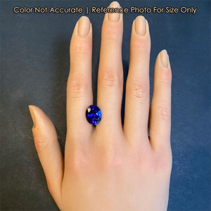 oval tanzanite gem size on hand