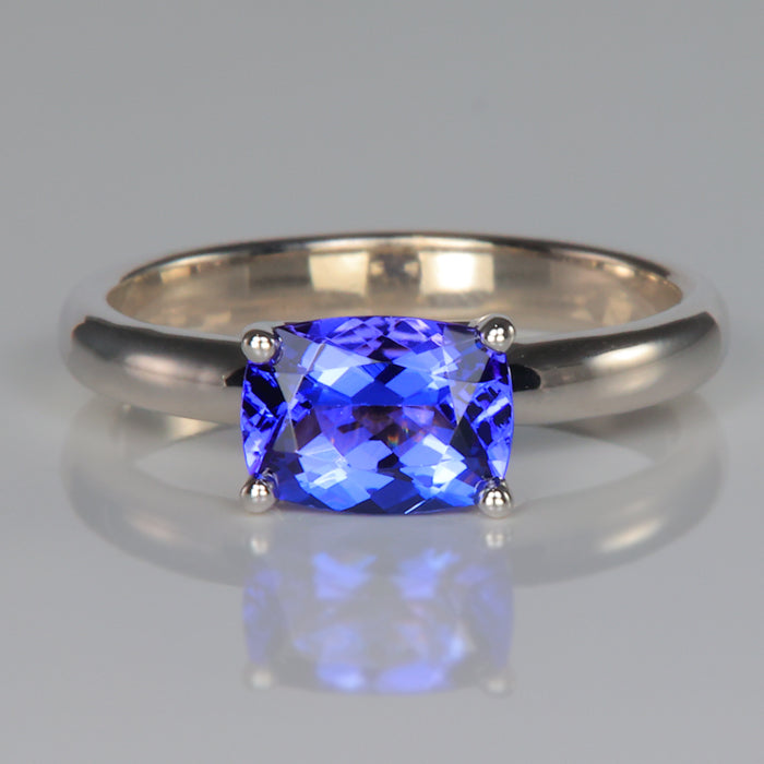 antique cushion cut tanzanite gemstone east west set in white gold 