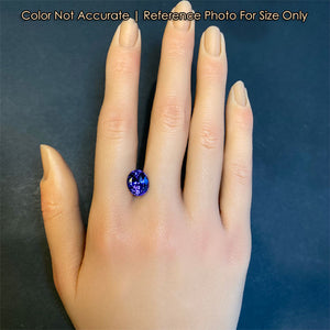 tanzanite gem oval cut on hand