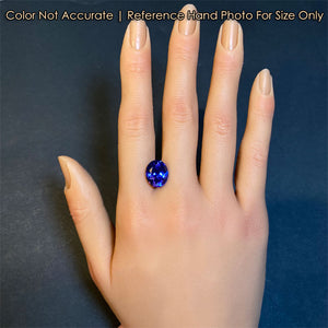 tanzanite gemstone on hand for size