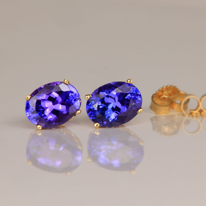 oval tanzanite earrings yellow gold