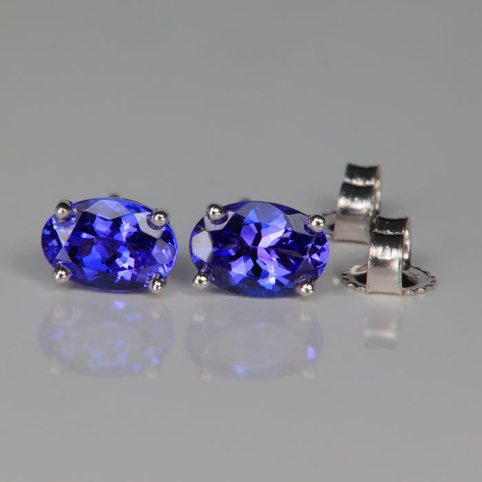 white gold and oval cut tanzanite gemstone earrings 