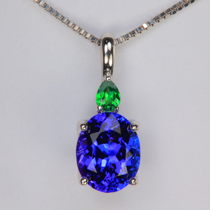 tanzanite gemstone pendant with tsavorite accent in white gold