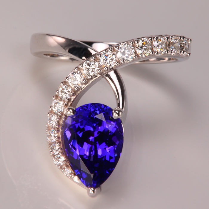 tanzanite pear shape brilliant cut in white gold with diamonds ring 