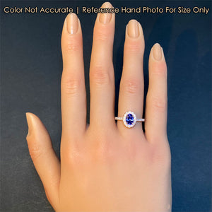 tanzanite ring with diamond halo in rose gold