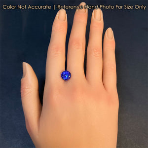 tanzanite round brilliant cut on hand