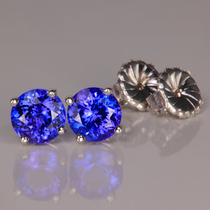 blue violet tanzanite rare gemstone earrings in white gold