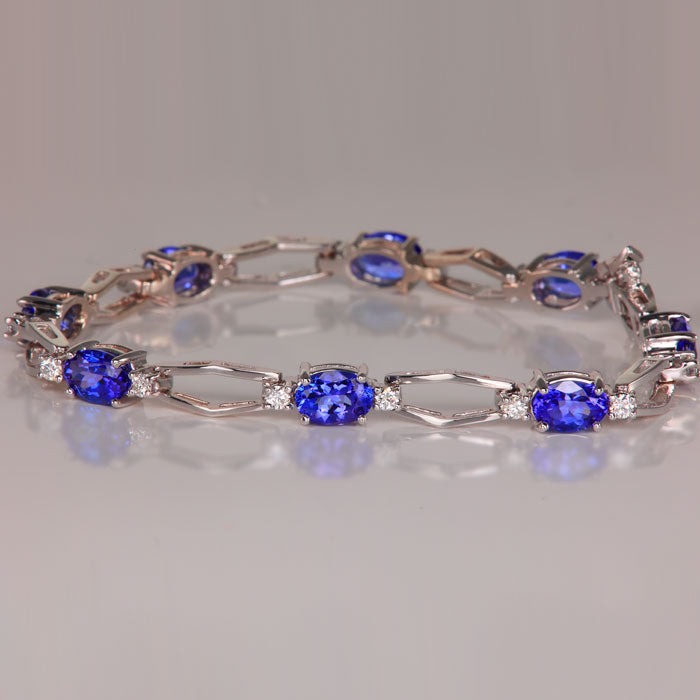 Amazon.com: Tennis Bracelet Natural 5X4 MM Oval Cut Blue Tanzanite Gemstone  925 Sterling Silver December Birthstone Wedding Jewelry Christmas Gift For  Her (Black Rhodium Plated Silver, 6 Inches): Clothing, Shoes & Jewelry