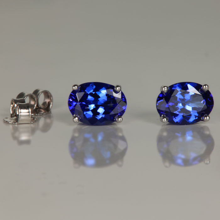 oval cut tanzanite stud earrings white gold