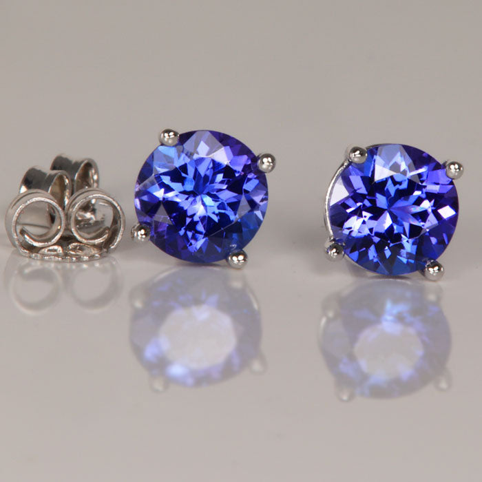 round cut tanzanite stud earrings white gold