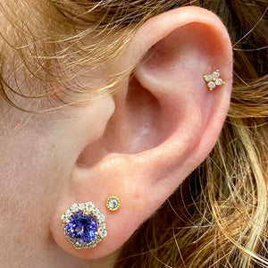 tanzanite and diamond studs on ear