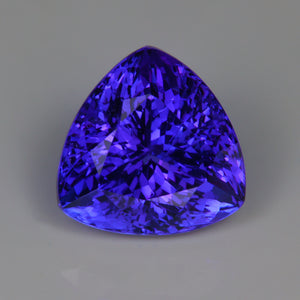 mostly violet tanzanite gemstone trilliant cut 