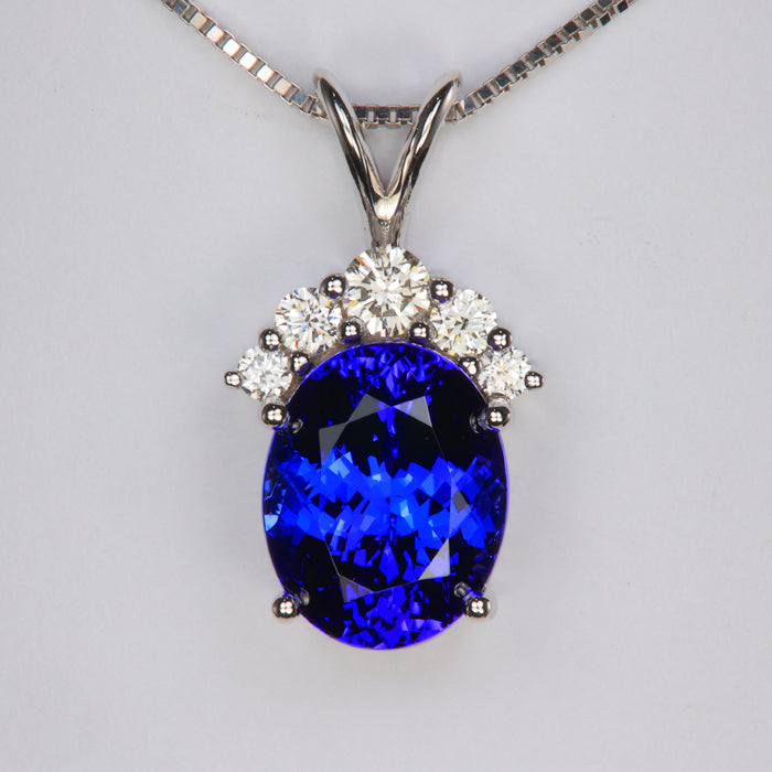 oval tanzanite and diamond pendant in white gold