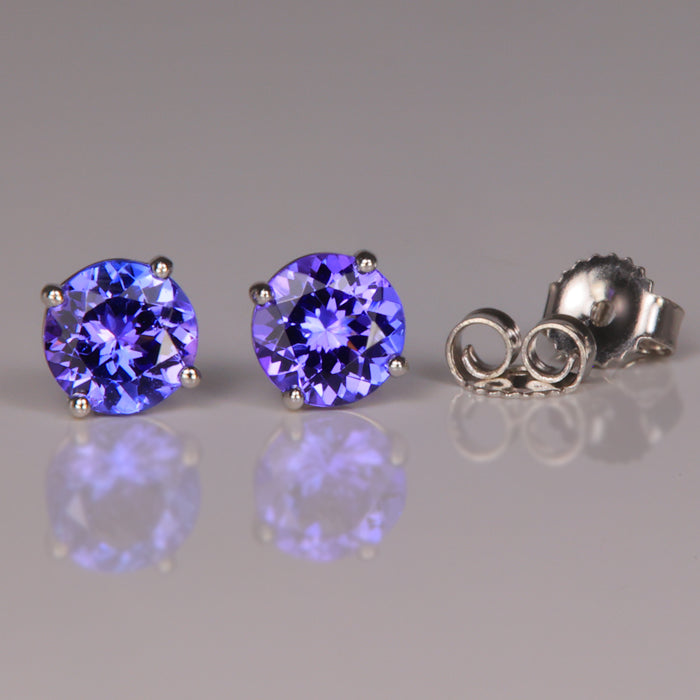 mostly violet tanzanite studs in white gold