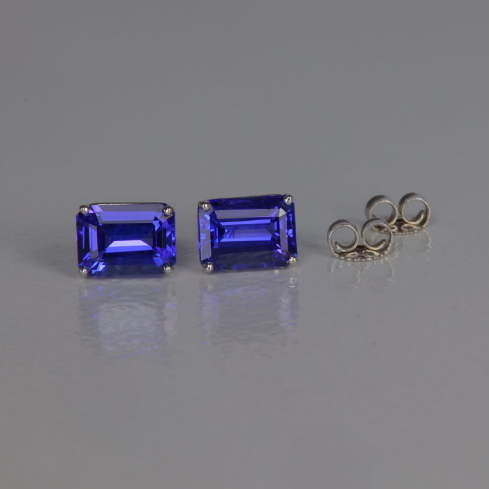emerald cut blue violet tanzanite earrings