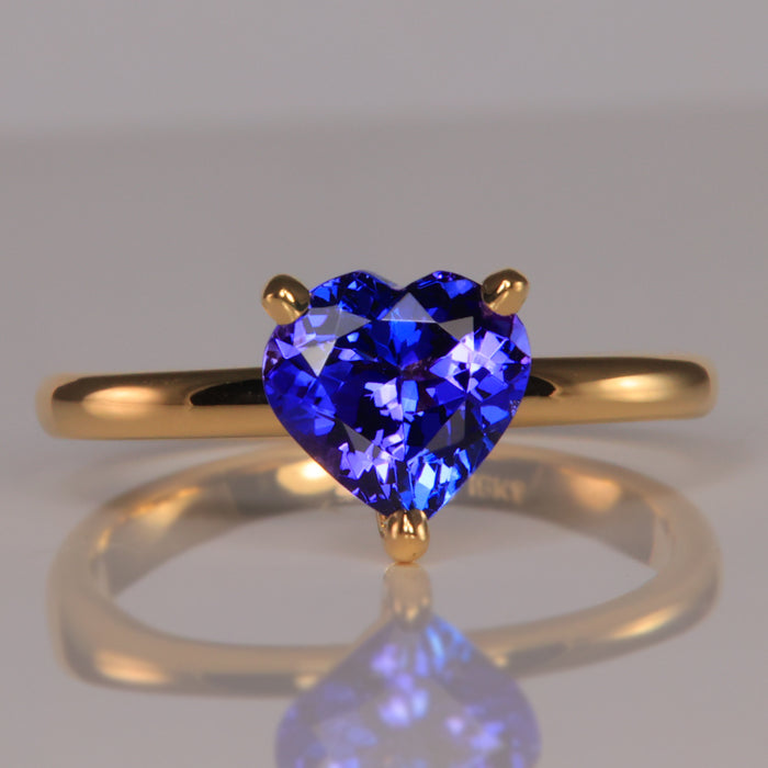 blue violet tanzanite heart shape gemstone ring in yellow gold