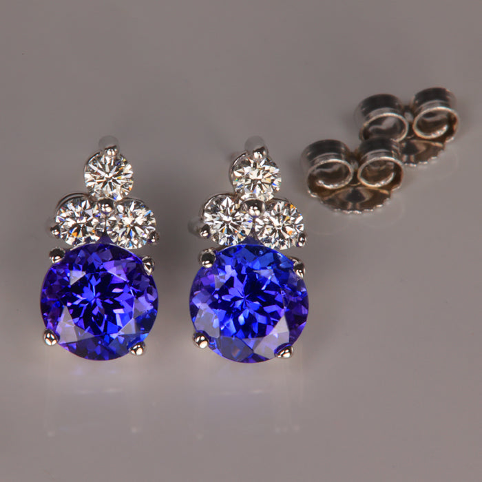 round brilliant tanzanites with diamond accent earrings