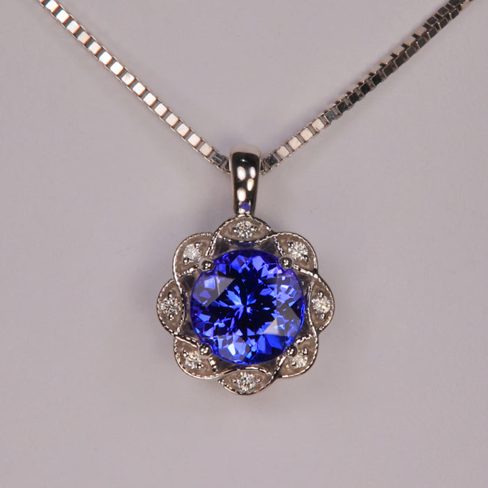 white gold tanzanite and diamond gemstone pendant