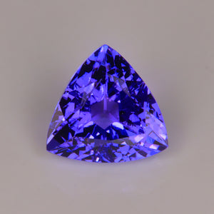 mostly violet tanzanite gemstone trilliant cut