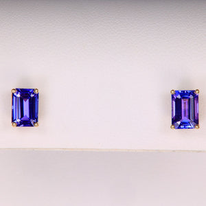 emerald cut tanzanite gemstone earrings in yellow gold