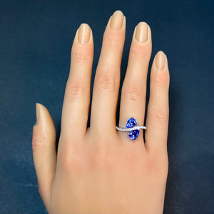 white gold ring with two pear shape tanzanite gemstones