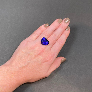 heart shape tanzanite on hand