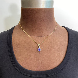 tanzanite pendant in yellow gold diamond accents