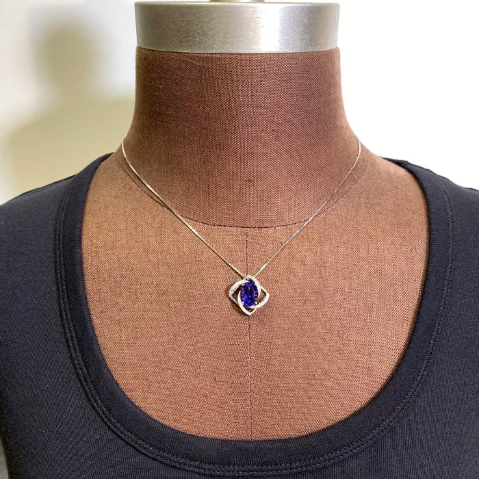 14K White Gold Oval Tanzanite and Diamond Pendant 4.22cts