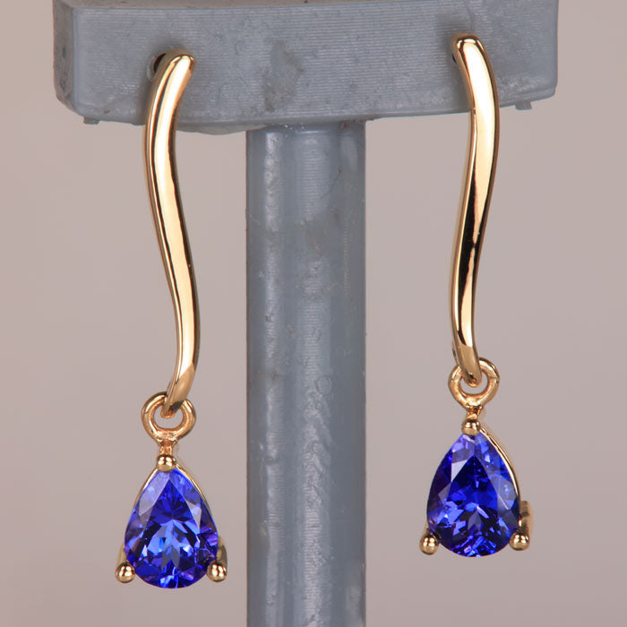 pear shape tanzanite drop earrings  yellow gold