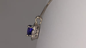 14K White Gold Round Brilliant Tanzanite Pendant With Diamonds 1.29 Carats