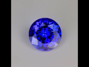 Round Brilliant Cut Tanzanites 5.35 Carats and 6.86 carat and one pair of 14 kt earrings