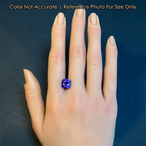 tanzanite in square cushion cut on hand