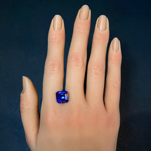 tanzanite gemstone on hand 