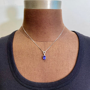 white gold tanzanite and diamond pendant