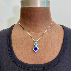 white gold pendant tanzanite blue zircon and diamond