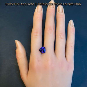 trilliant tanzanite on hand