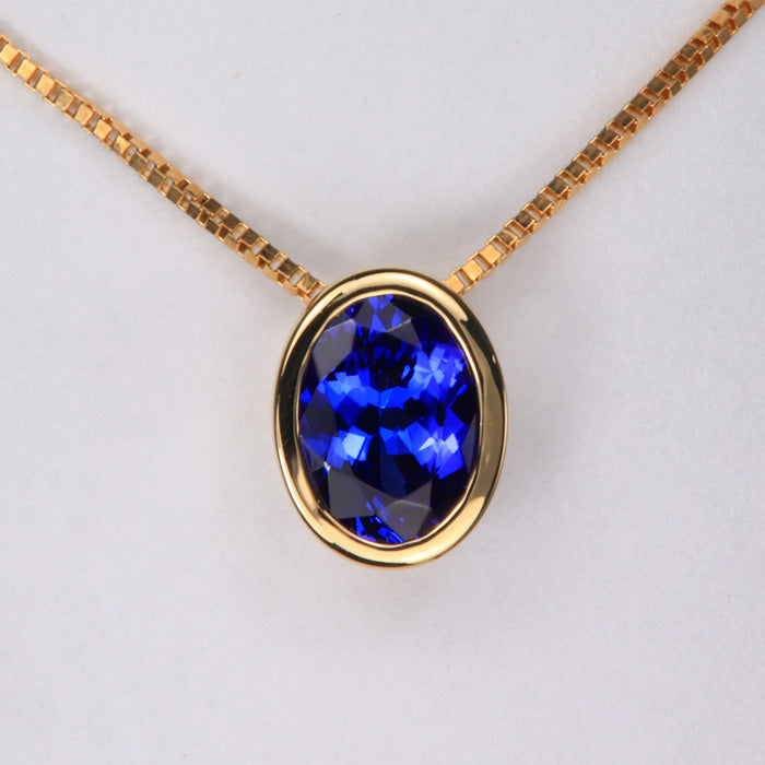 Oval Tanzanite Bezel Set Pendant with Chain 