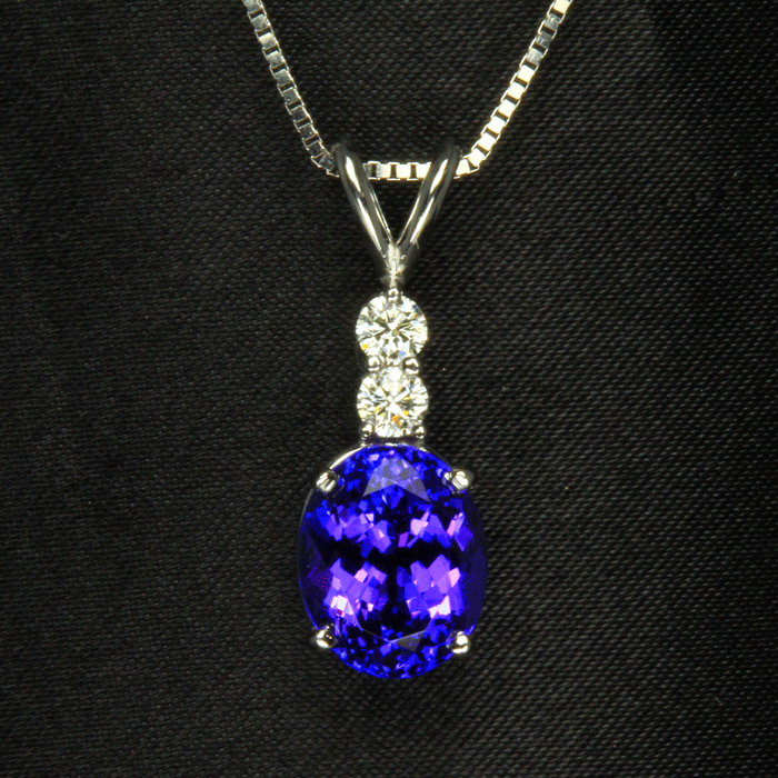 Tanzanite Pendant and Earring Set. 7.71 Carat Total .74 Carats Diamond