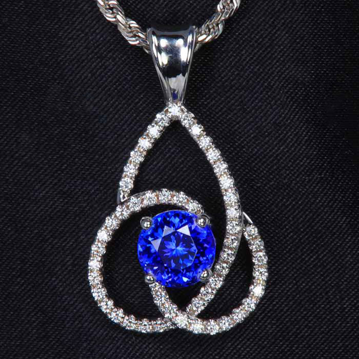 White Gold Tanzanite and Diamond Swirl Pendant