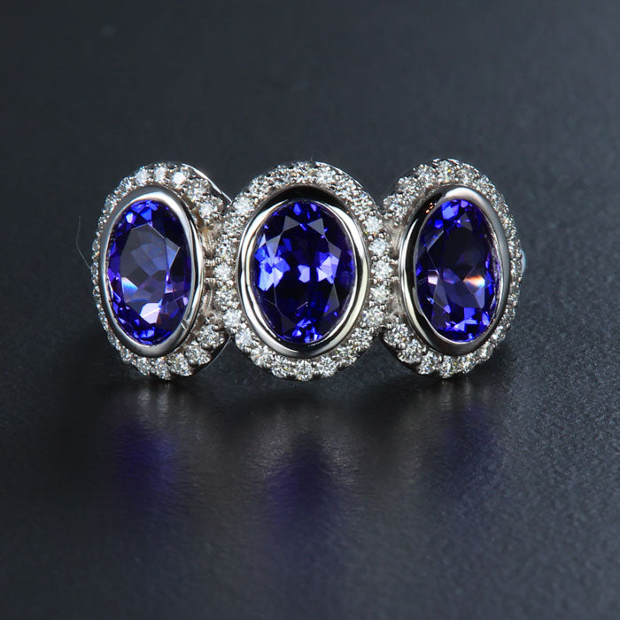 White Gold Three Stone Tanzanite and DIamond Halo Ring 