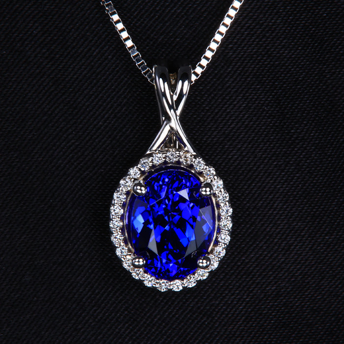 Oval Tanzanite and Diamond Halo Pendant