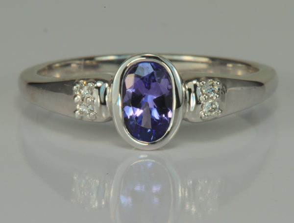 White Gold Tanzanite Ring with 6x4 MM Oval and Fine Diamonds