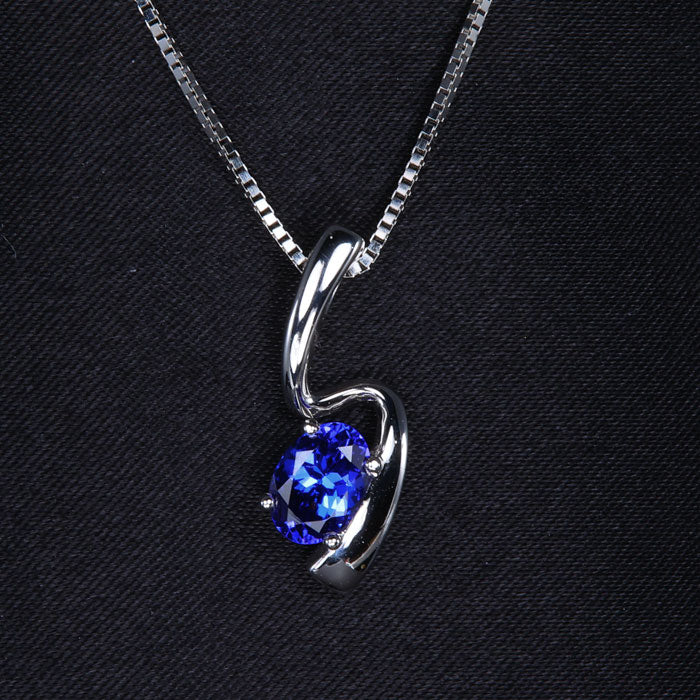 14K White Gold Oval Tanzanite Freeform Pendant .95 Carats